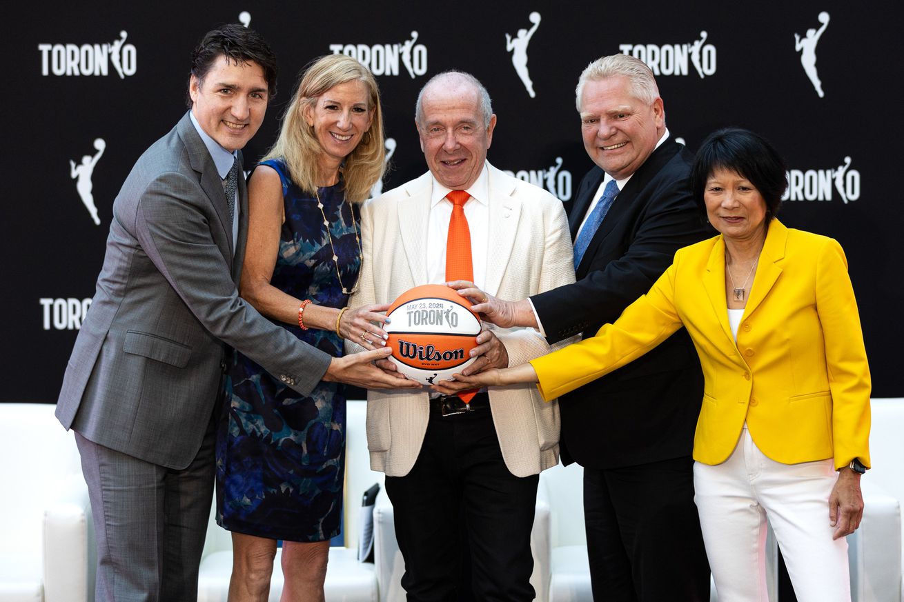 Prime Minister Justin Trudeau and other dignitaries announce the expansion of the WNBA to Canada with a team in Toronto.