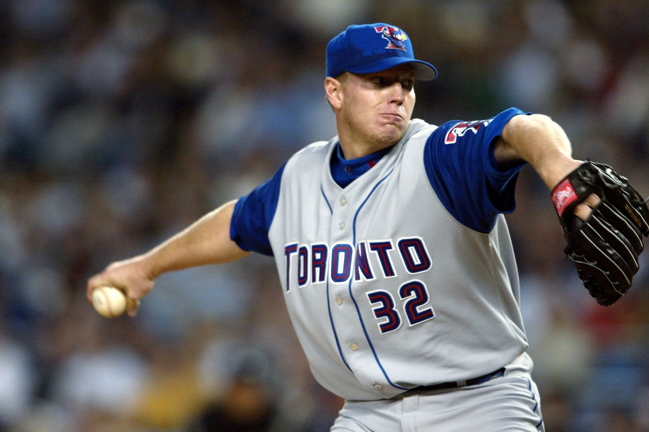 Toronto Blue Jays’ starter Roy Halladay delivers a pitch aga