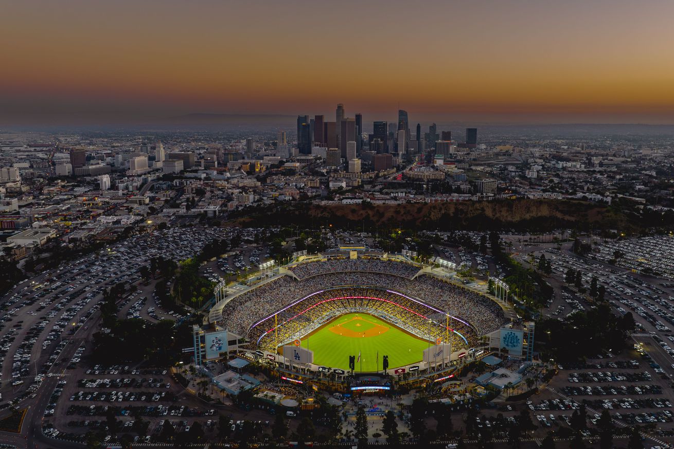 Aerial of Dodger Stadium shows Los Angeles Angels defeating Los Angeles Dodgers 3 to 2 to capacity crowd