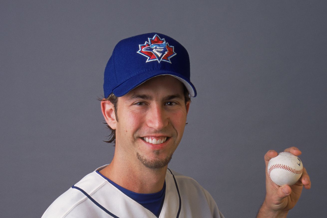 Mike Sirotka poses for a studio portrait.